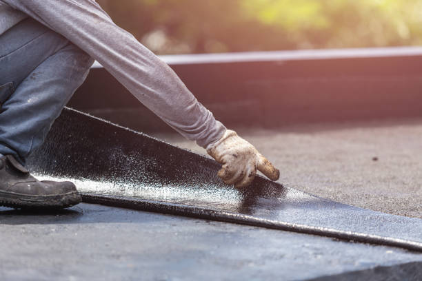 Professional Waterproofing technician working in Tigerton, WI